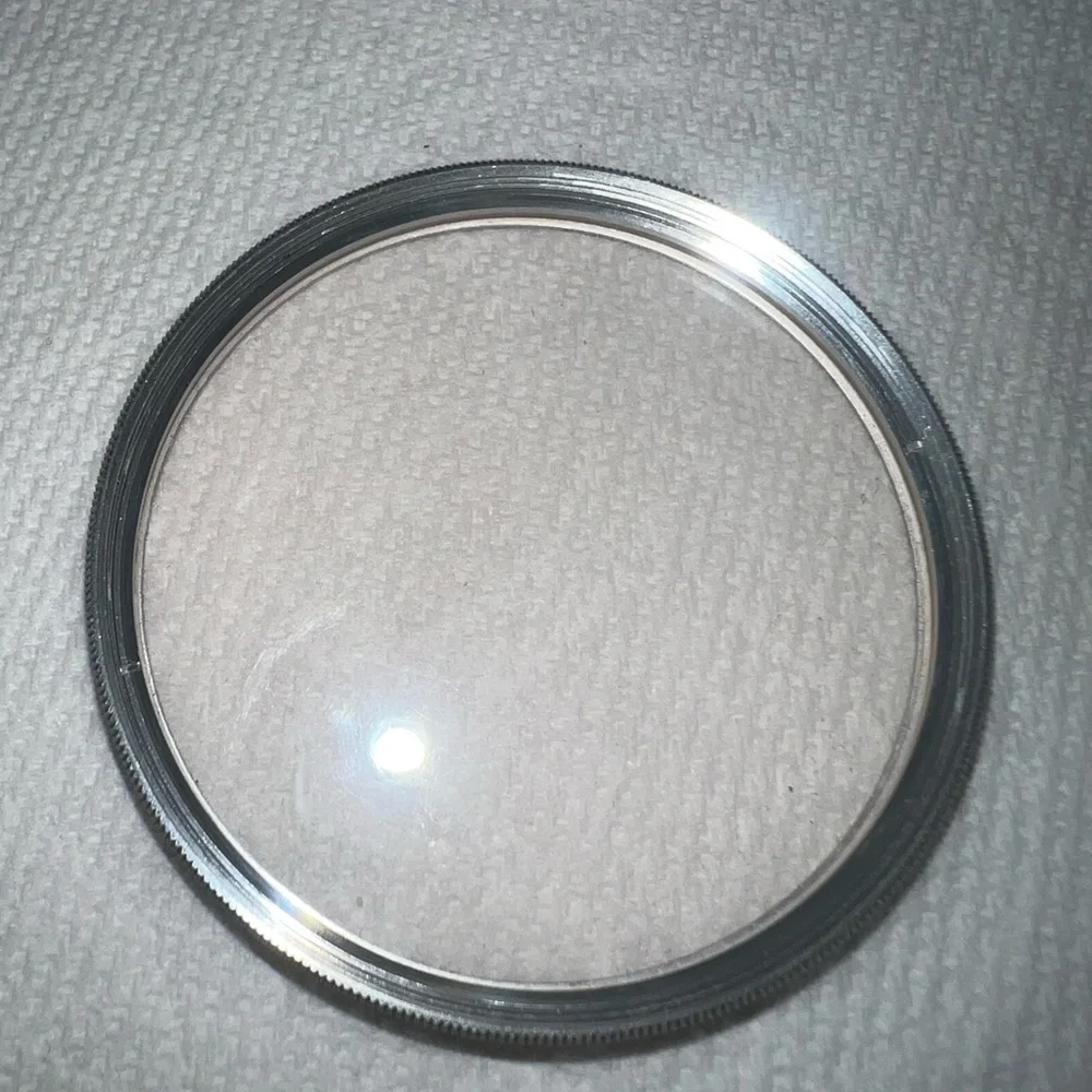 Yashica 55mm Skylight 1A filter.